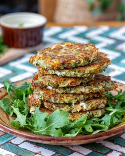 Courgette fritters with potato, onion and feta, served with a bowl of homemade tzatziki. Crisp edges, soft centres, and just the last of this year’s courgettes from the allotment.
I make a version of these every year - this one’s a little richer, and the feta adds a nice bit of sharpness.
#courgettefritters #allotmentharvest 
#homegrownharvest #simpleplates 
#zucchinifritters