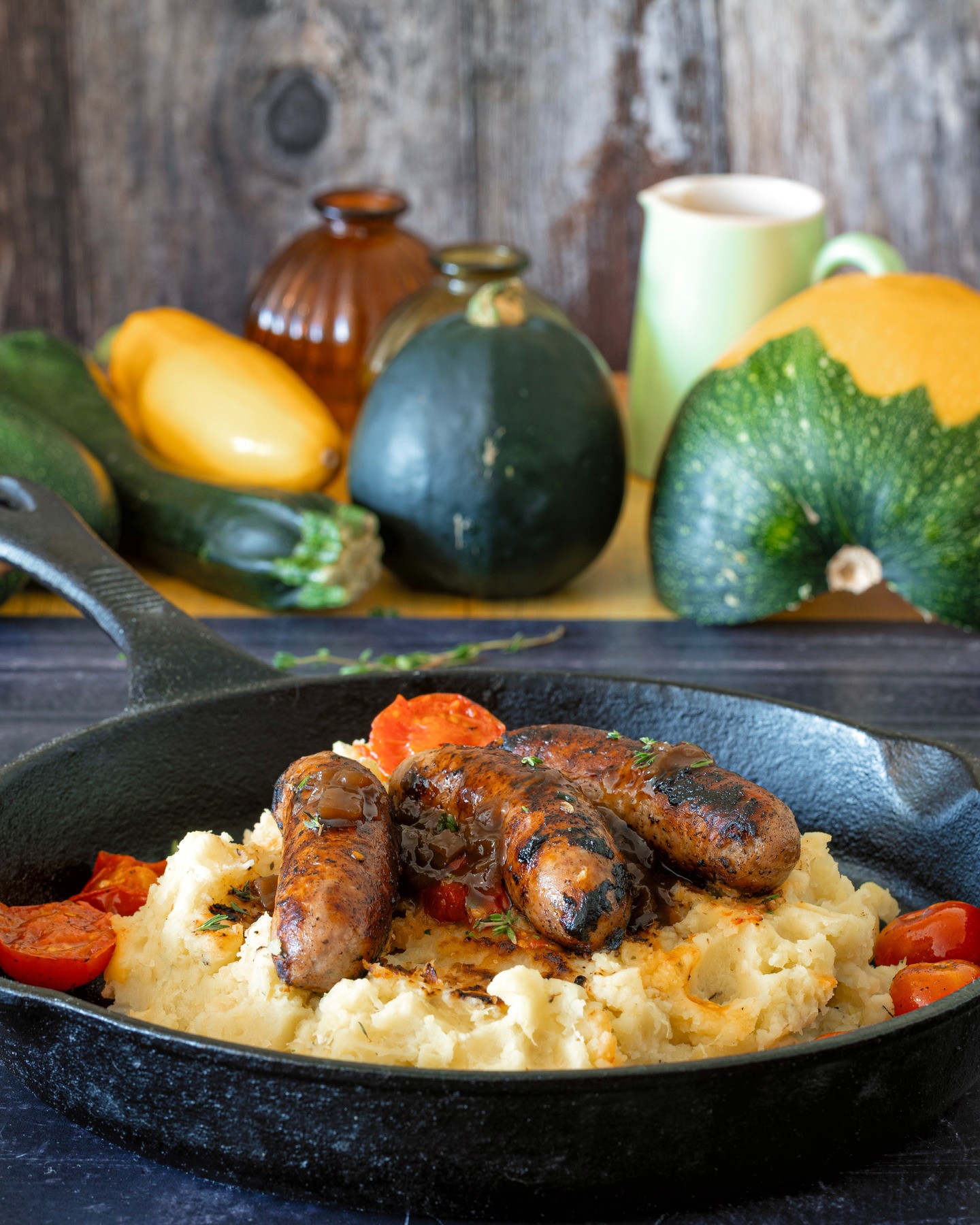 Bangers and mash, but with a bit of a twist from the garden.
The mash is made from buttery Yukon Gold potatoes and a hybrid courgette grown jon an allotment next door by Thor Davidson, head chef at Luigi’s. He handed a few over from his kitchen garden and they’ve added a soft, earthy sweetness to the dish.
Three country-style sausages, proper onion gravy, and a rustic cast iron pan. A plate made for cold evenings and second helpings.
#sausageandmash #kitchengarden #goodfoodgoodmood