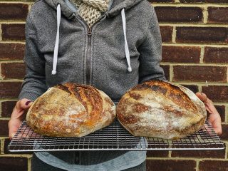 We baked these two sourdough boules after it was suggested trying our leftover strained Greek yoghurt whey. 

Slight dense crumb, sweet aroma, but a crisp crust and a pleasing sour tang. Toasts well too. Next time I’ll try just 200g whey and see if I can open the crumb up a little. 

#sourdough #yogurtwhey #rusticsourdough